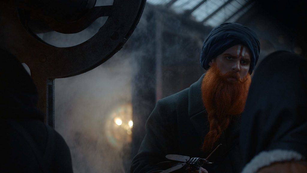 [o imdb desse filme é muito ruim, perdão]
O boticário, que tem uma barba ruiva grande e enfeitada, dialoga com outro personagem