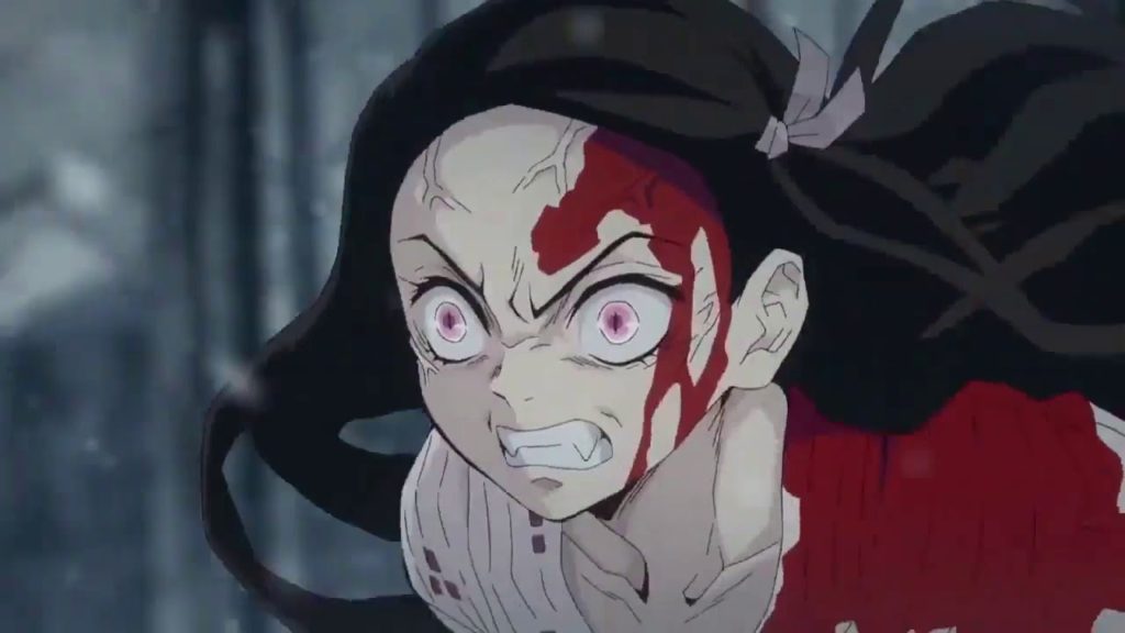 Nezuko Kamado, transformada em Oni, rosto ensanguentado, veias protuberantes, ira nos olhos e presas afiadas do lado de fora. Kimetsu No Yaiba, Maratona de Sofá