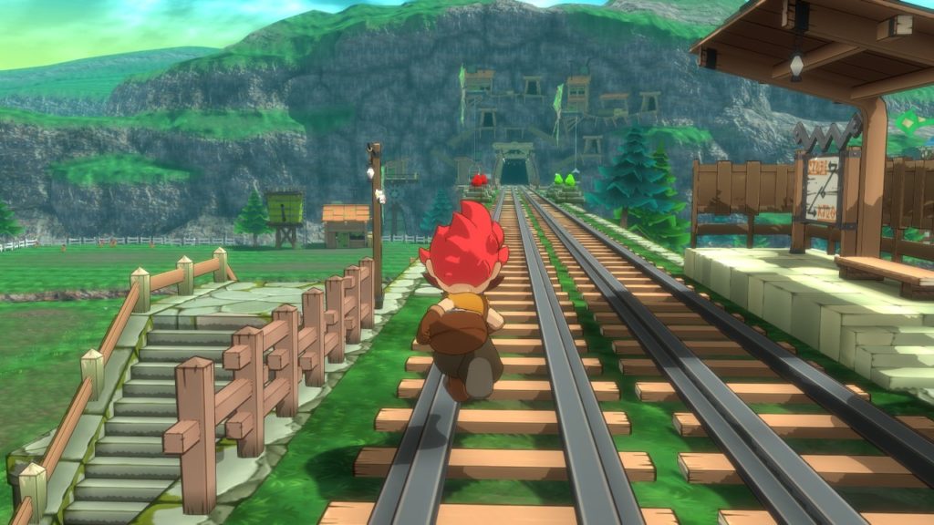 O personagem avança a pé nos trilhos que levam para o que parece ser uma estação de mineração.