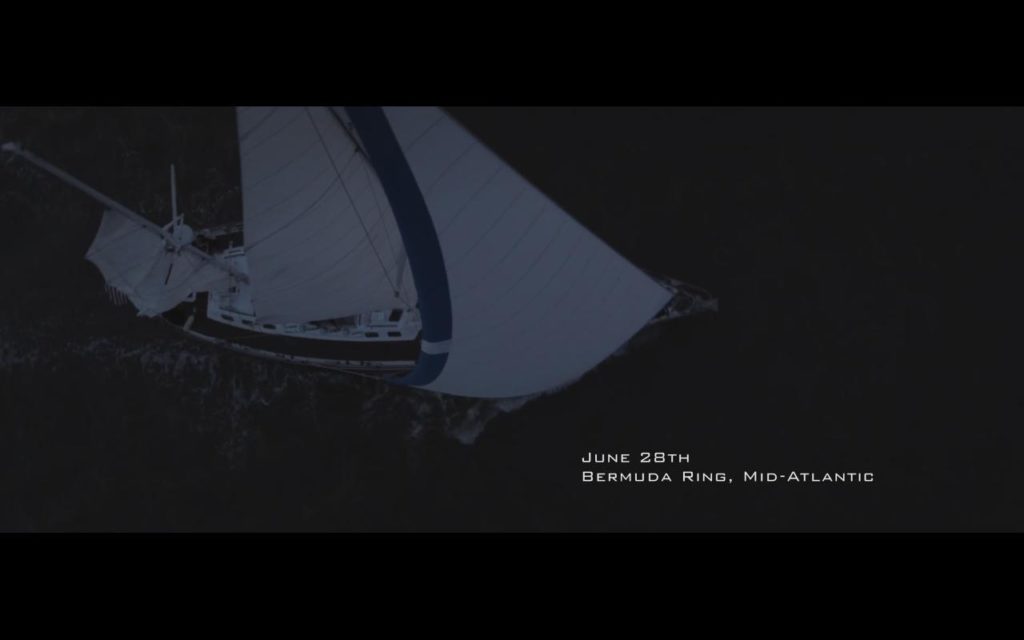 Em vista aérea, o veleiro Mary, reformado, está em foco, singrando os mares. Lê-se a legenda "June 28th. Bermuda Ring, Mid-Atlantic"