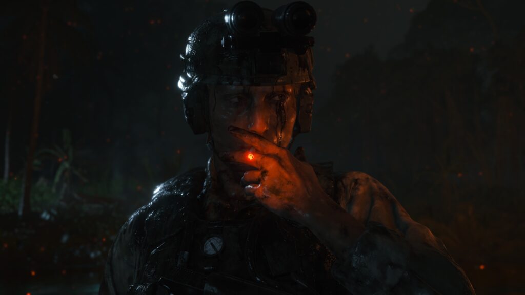 Cliff(personagem de mads mikkelsen) fumando um cigarro numa floresta, paramentado com roupa militar