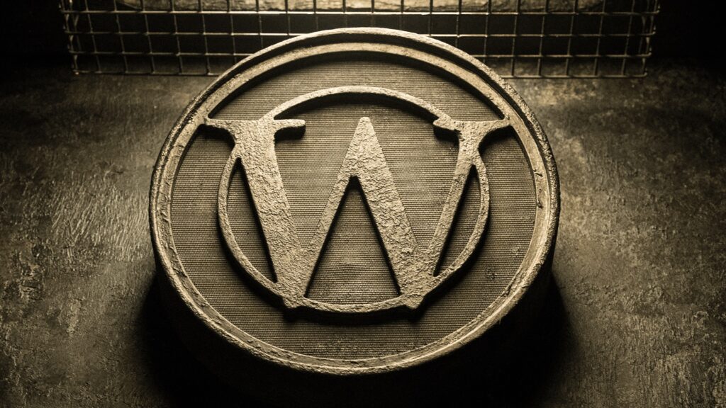 Emblema de Wilford (uma letra W cercada por dois séculos)