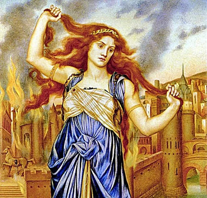 Pintura de Cassandra. Ela está com roupas azuis e bege, e puxa os próprios cabelos. O rosto aparenta inexpressividade. Ao fundo, uma cidade (Tróia, podemos ver o cavalo de madeira ao fundo) pegando fogo